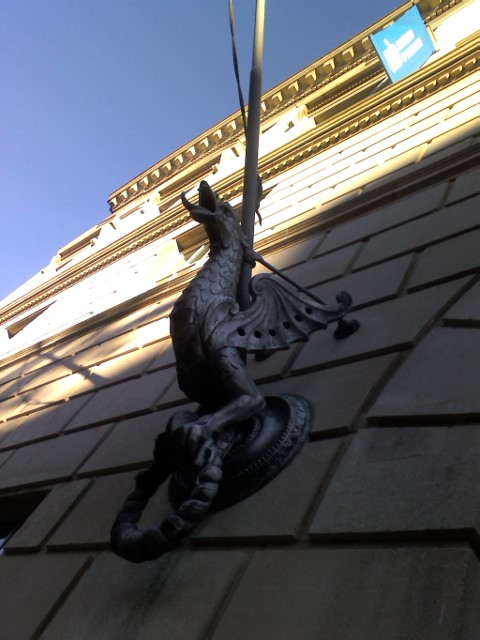 One of the guard dragons at the Liberal Arts and Policy building looks out over the building's southern entrance.